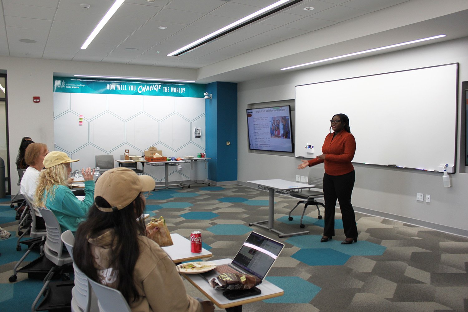 Lilian Olivia Orero presenting a lunch lecture