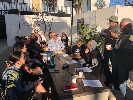 Kroc students talking with deported U.S. veterans in Tijuana