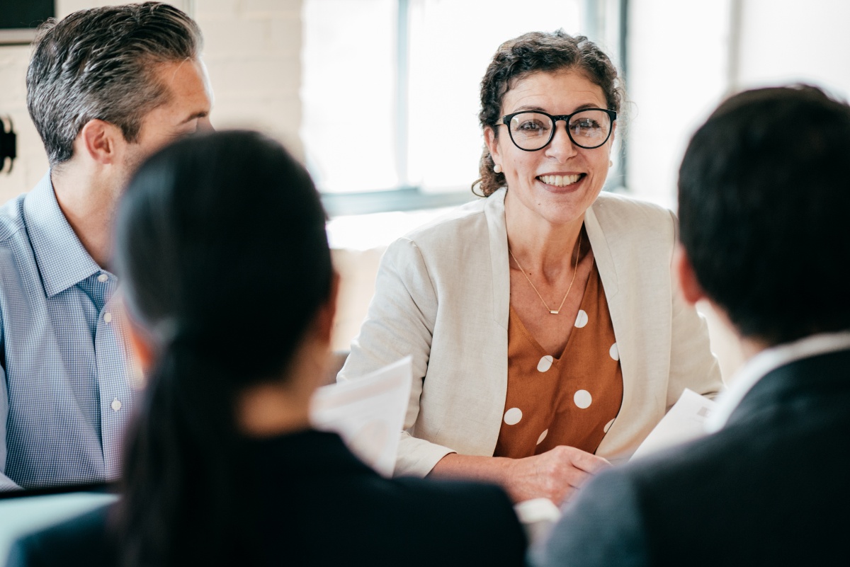 smiling woman in a business meeting