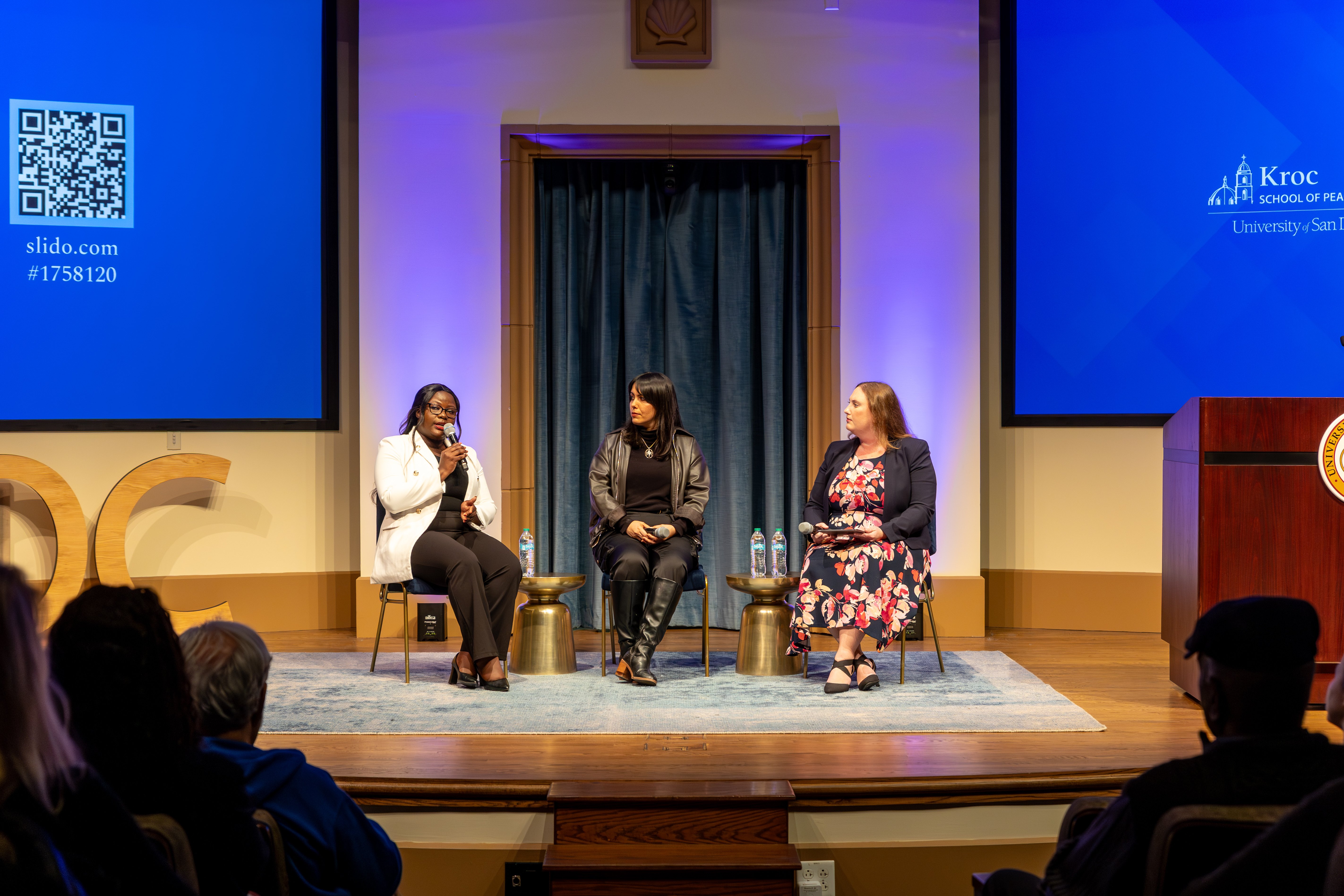 Women PeaceMakers Lilian Olivia Orero and Estefanía Castañeda Pérez, and Kroc IPJ Program Officer for Women, Peace and Security Briana Mawby onstage