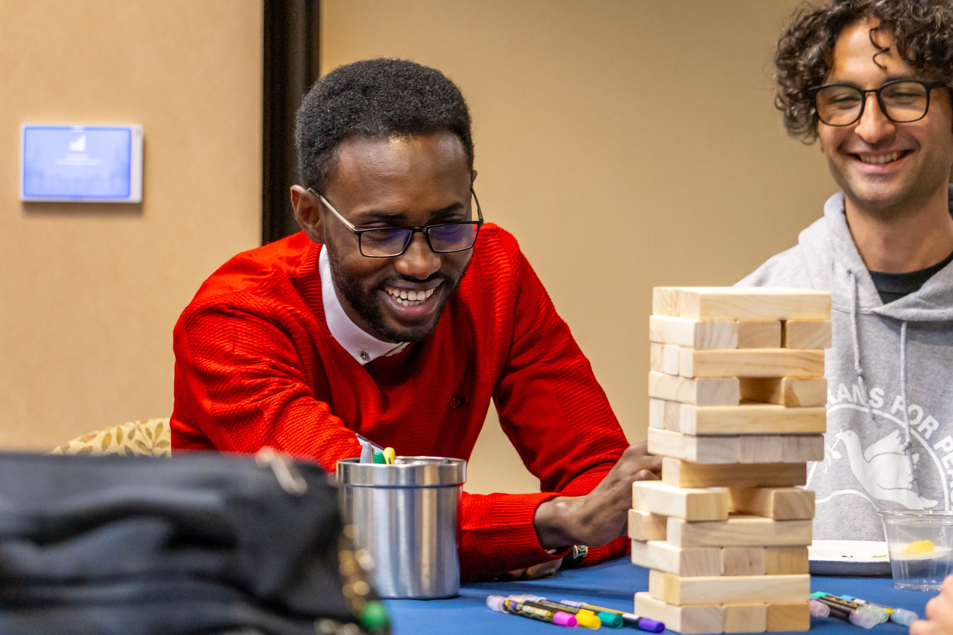 Kroc School students playing Jenga